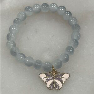 Elegant Beaded Bracelet with Butterfly Charm